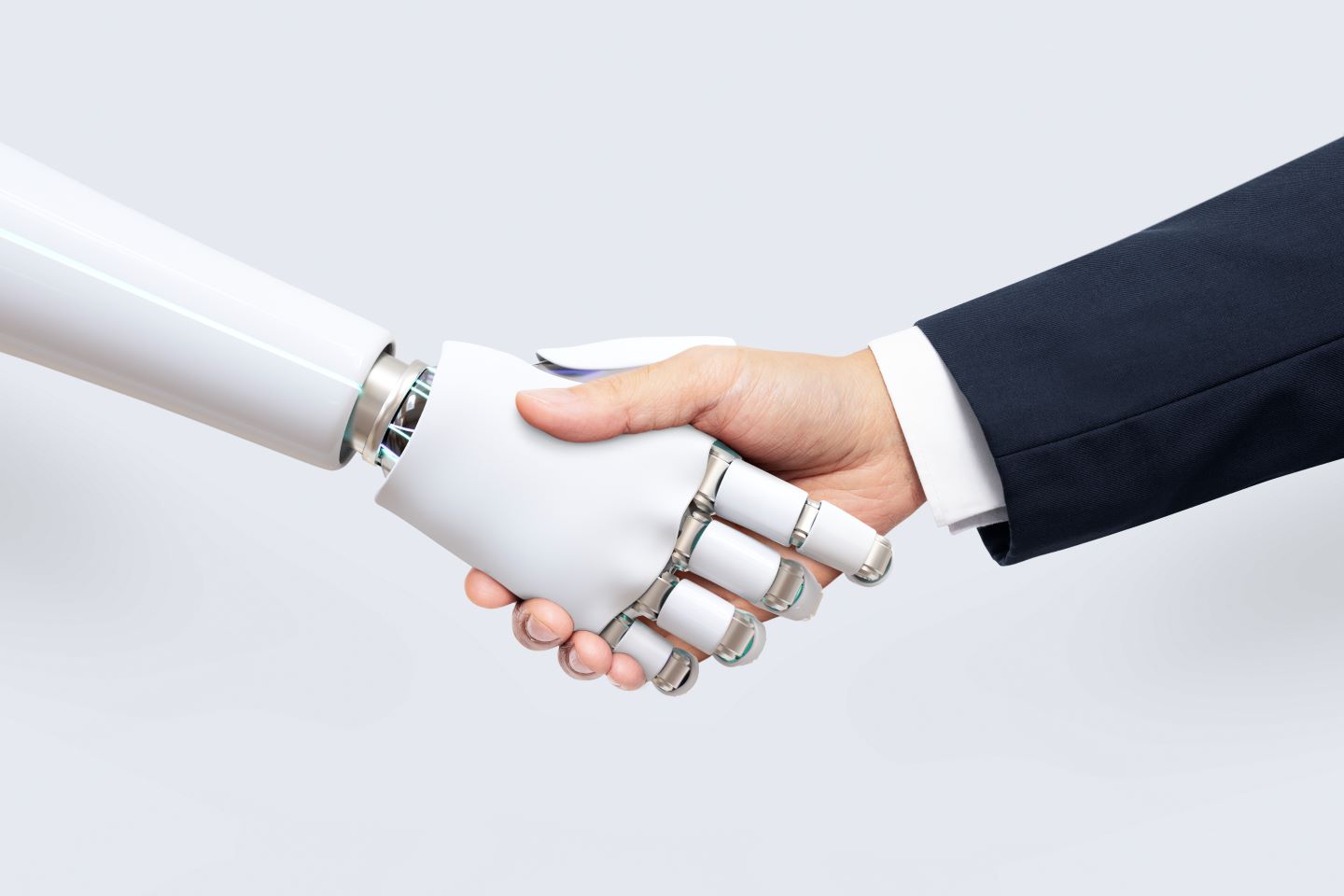 Robot hand and human hand shaking hands