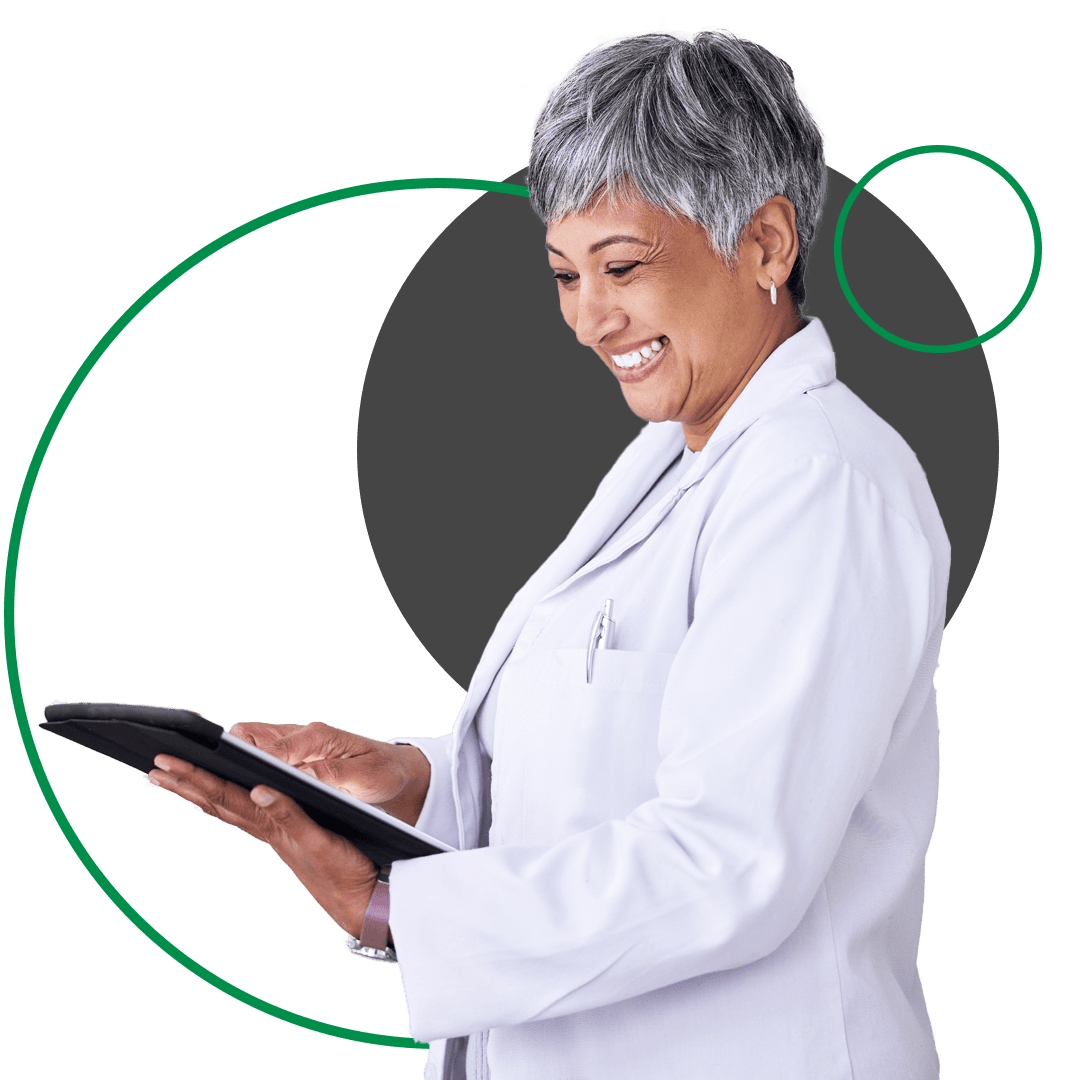 Pharmacist looking at Facebook ad campaign managed by Digital Link on a tablet